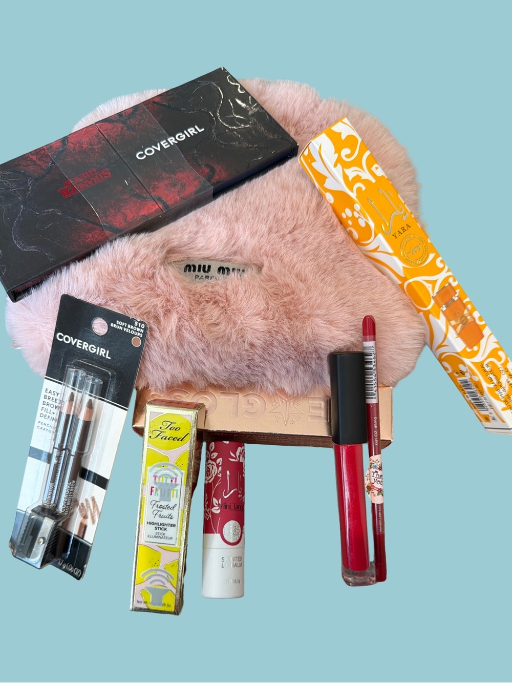 Miu Miu make up case with beauty products